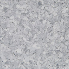 Schist Stone epoxy flake blend — pale gray and silver-white chips on a light stone base