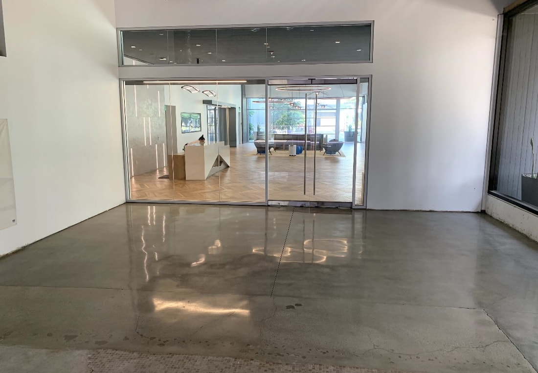 Commercial lobby floor with a polished concrete epoxy finish