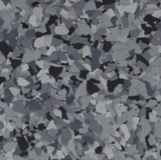 Nightfall epoxy flake blend — deep navy and charcoal chips on a dark slate base